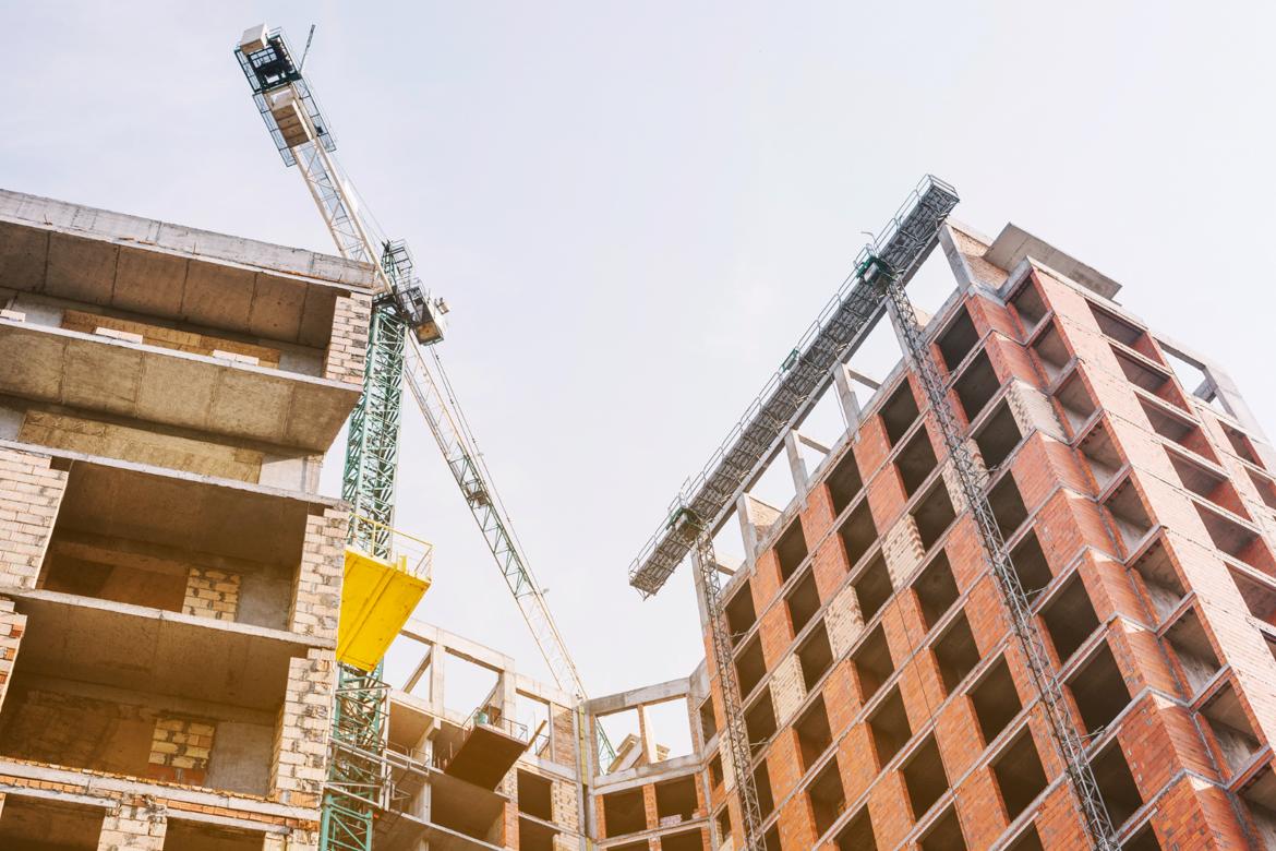 Crane being used in the construction of a new residential building.